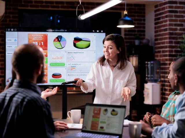 smiling-caucasian-woman-in-startup-office-doing-bu-2025-02-17-08-26-14-utc